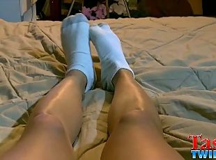 Angel jerks off and cums on his feet